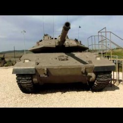 Close look at IDF Merkava MK-IV Tank (4 Cobra Helicopters  flying above)